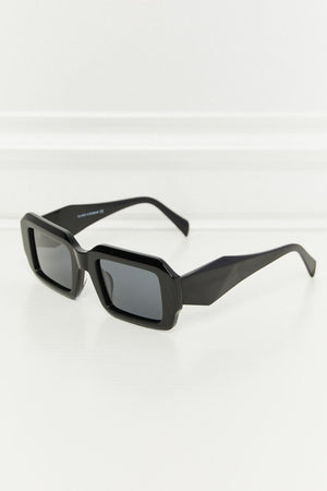 Black geometric frame polarized sunglasses with acetate material.