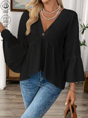 Black cotton V-neck babydoll blouse with bell sleeves and a single button detail.