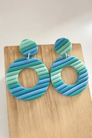 Textured hoop earrings in aqua with striped pattern and circular design
