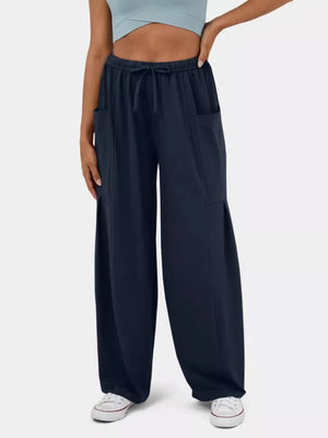 Dark Blue maternity pants with drawstring waist and wide legs, featuring cargo pockets.