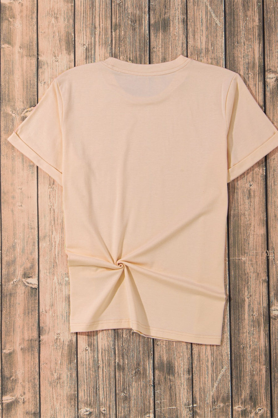 Tan crew neck t-shirt with cuffed sleeves and a knotted hem detail.