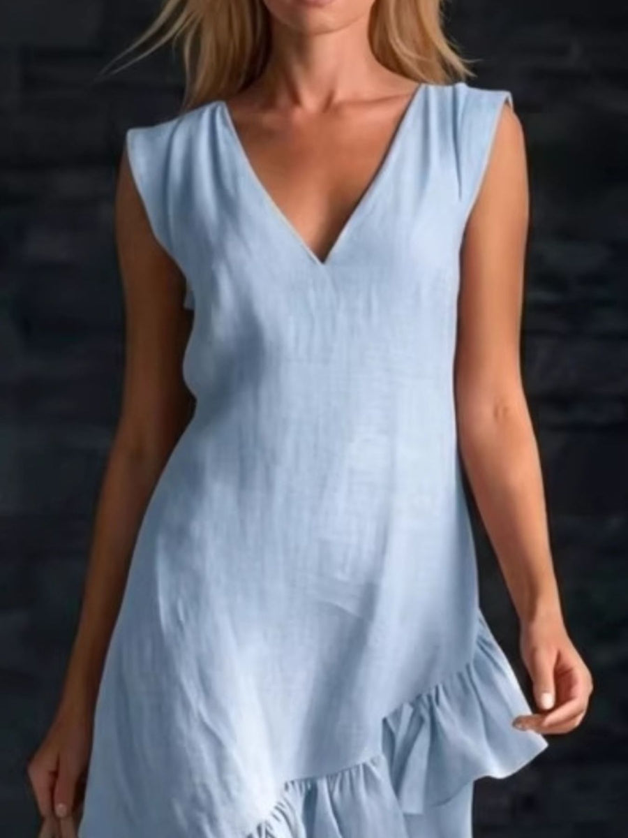 Light blue ruffled hem dress with V-neck and cap sleeves.