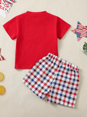 Baby boy's red t-shirt and patriotic plaid shorts set for summer.