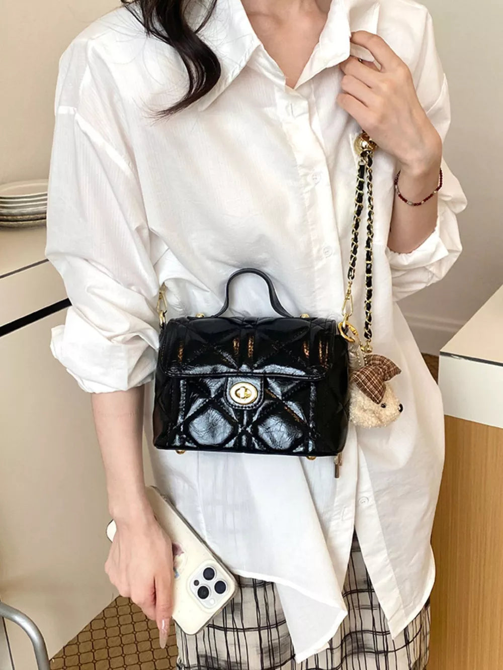 crossbody bag featuring quilted in Black with PU Leather Imported Size &amp texture