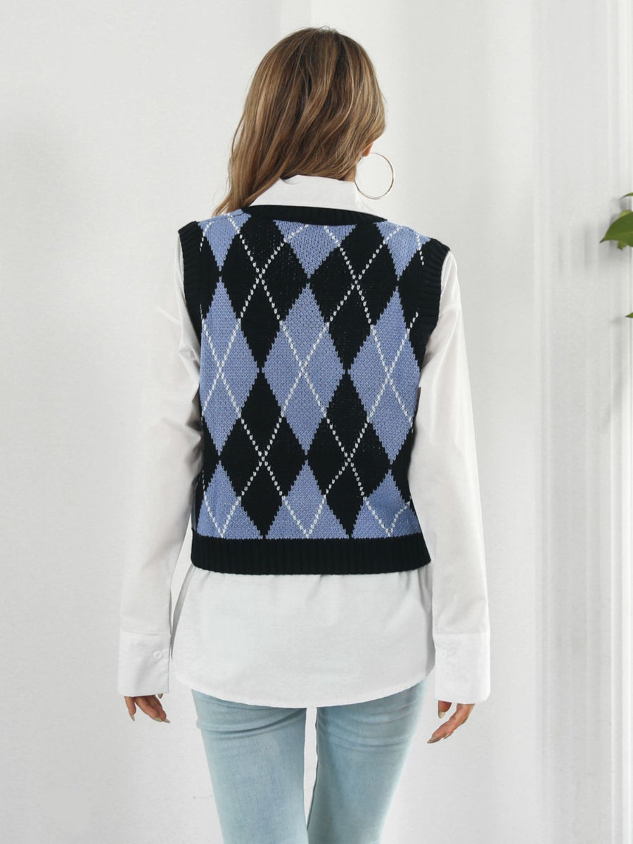 Black argyle knit vest with blue and white diamond pattern, acrylic material.