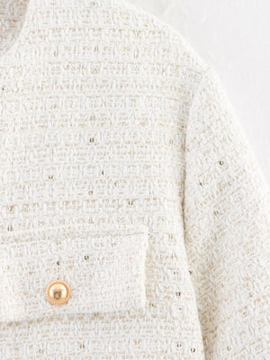 White tweed bolero jacket with gold sequins and button pocket detail