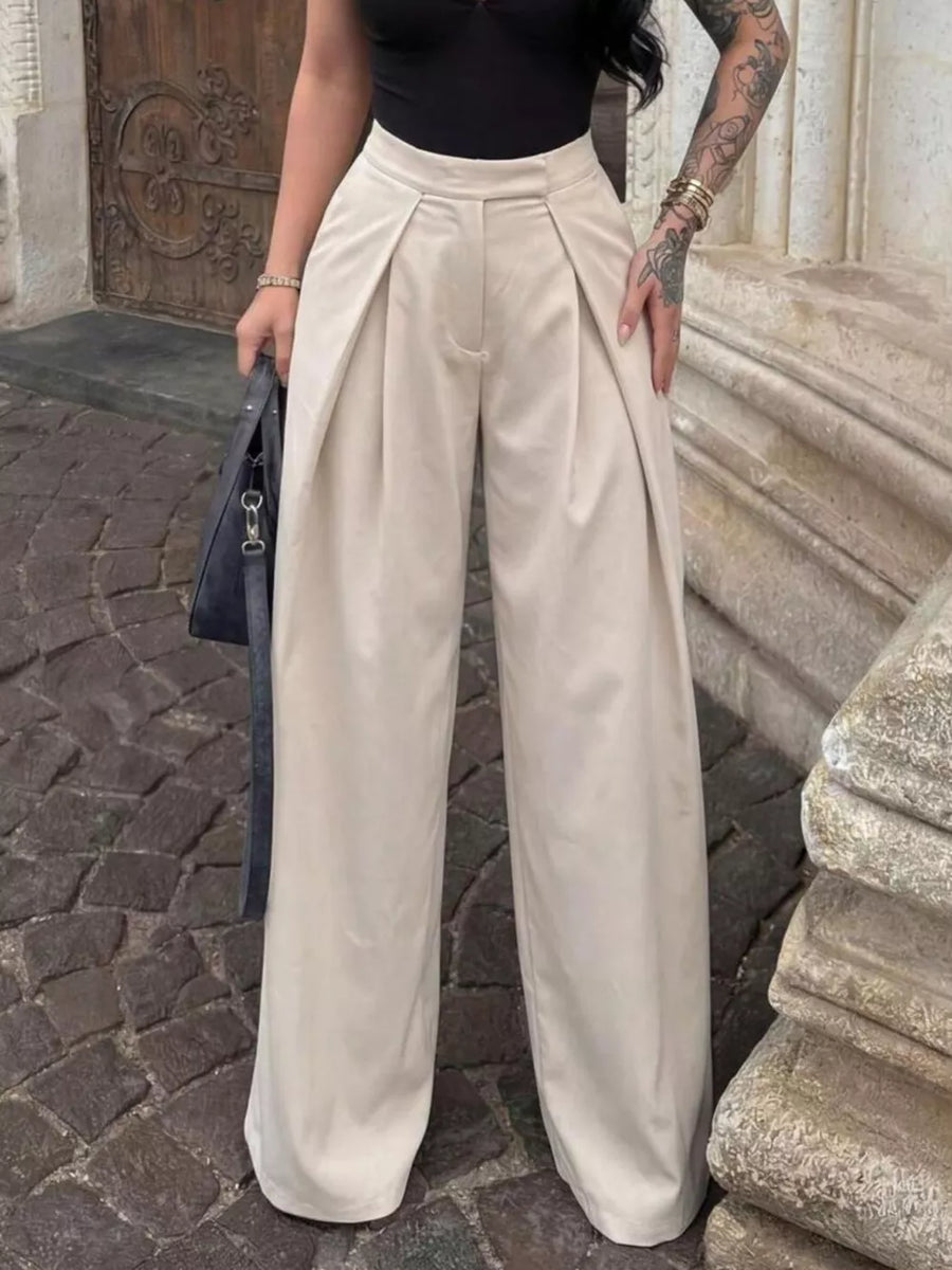 Elegant beige high-waisted wide-leg maternity trousers with pleats.