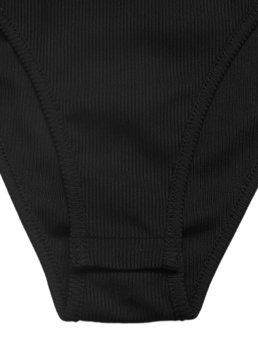 Black ribbed bodysuit detail showing seams and gusset.