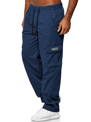 Navy blue cargo pants with adjustable drawstring waist and side cargo pocket.