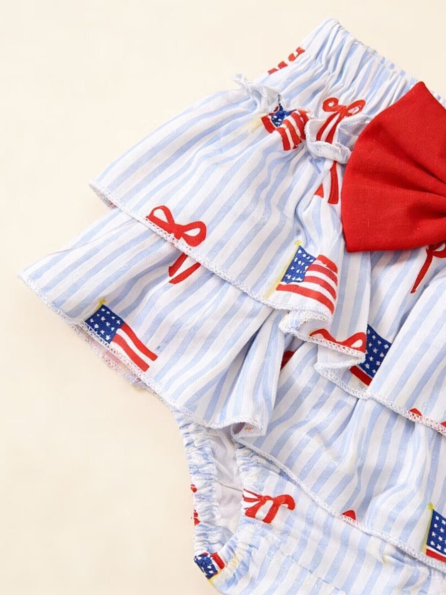 Baby set with blue and white stripes, American flag and bow print, and red bow detail.