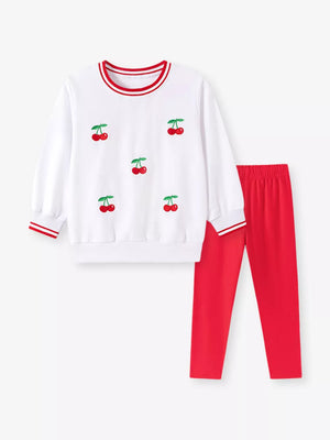 red sweatshirt and pants set featuring two-piece set and cherry print