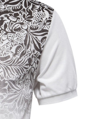 Polo shirt with floral print on left side and white short sleeve.