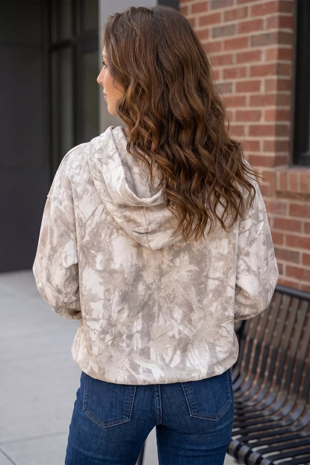 taupe pullover hoodie featuring pocketed and abstract