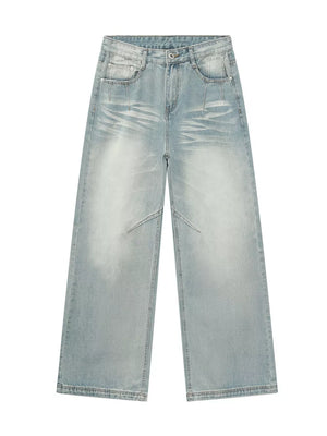 Light wash cotton wide-leg jeans with vintage fading and a relaxed fit.