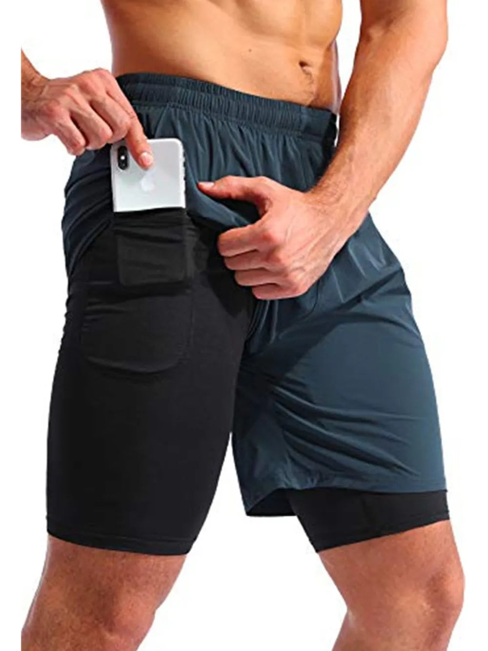 Dual-layer training shorts in Peacock Blue with black compression liner and phone pocket.
