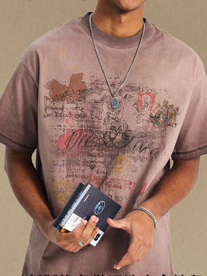 Mocha vintage wash t-shirt with distressed graffiti graphic print and crew neck.