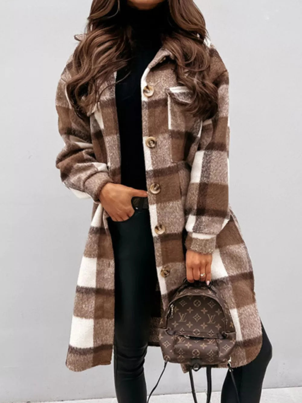 tan overcoat featuring buttoned and plaid