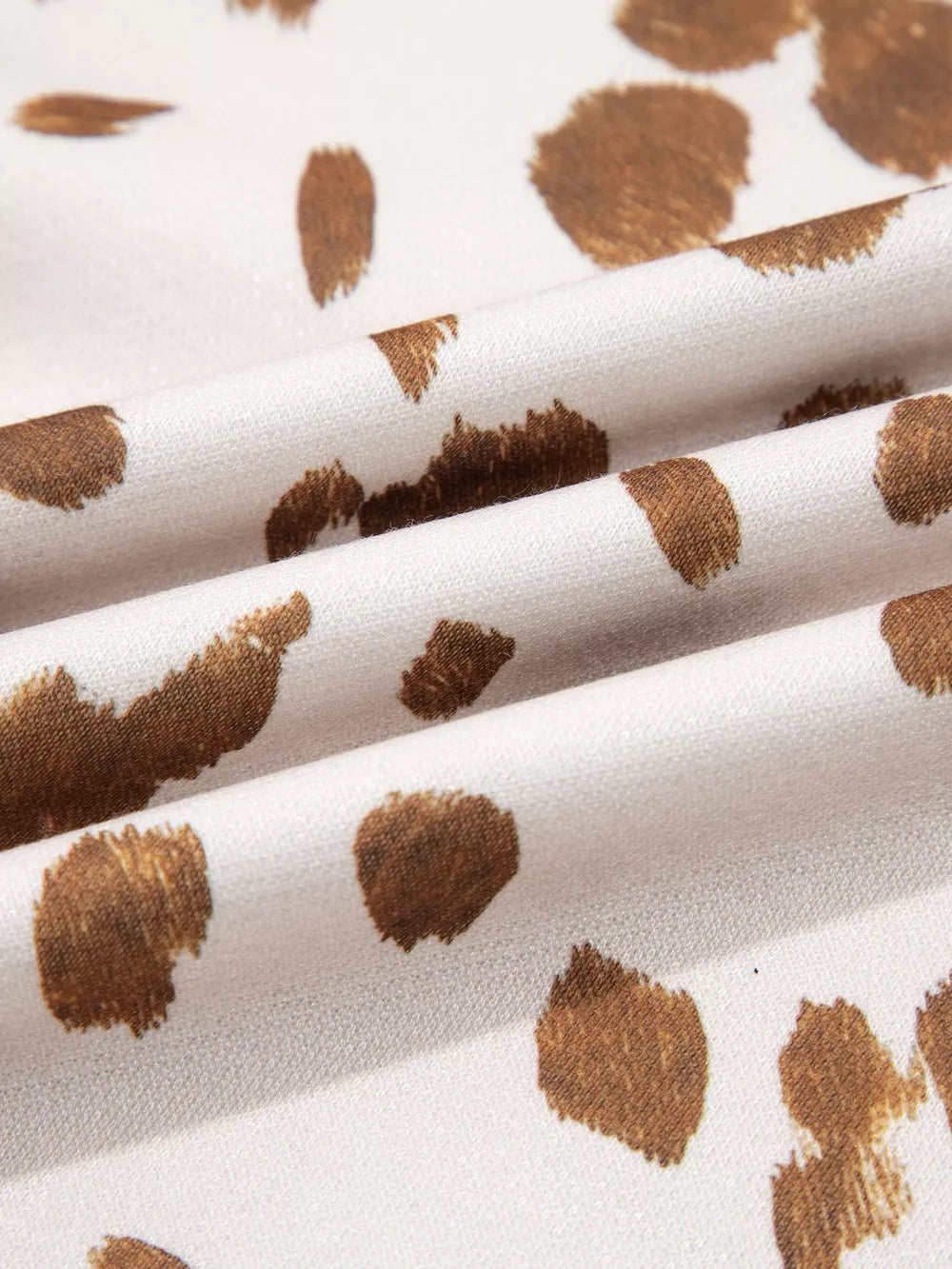 sweatshirt featuring leopard in brown with 100% polyester Care instructions: Machine wash cold texture