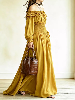 maxi dress in Black with off-shoulder and long sleeve