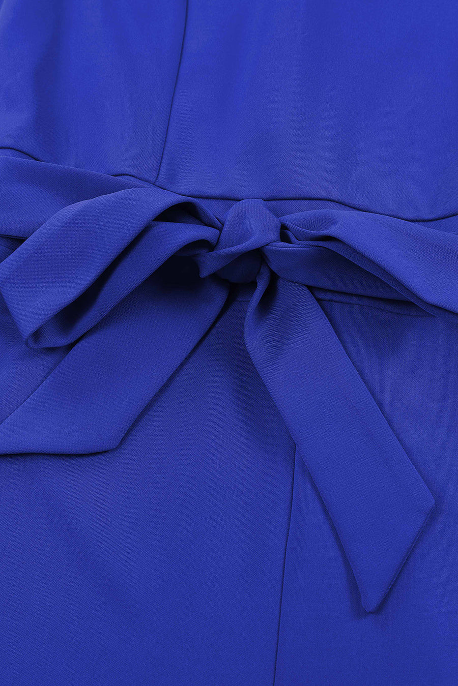 Royal blue tie-waist jumpsuit with a bow detail at the waist.