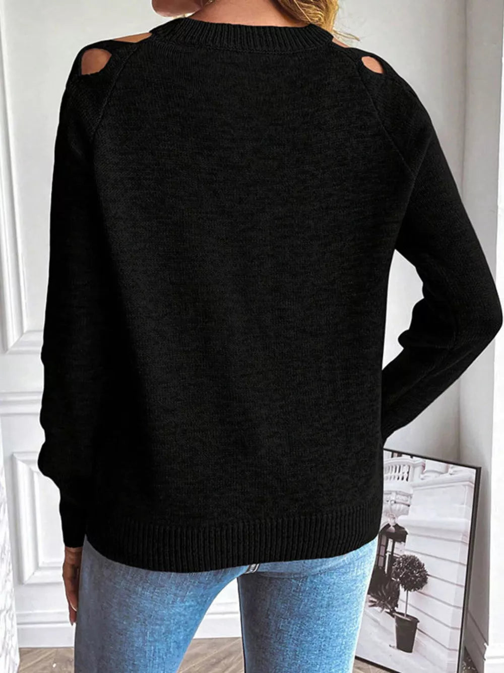 edgy pullover sweater in Black with crew neck