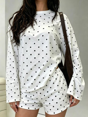 black pajama set featuring stretch and polka dot