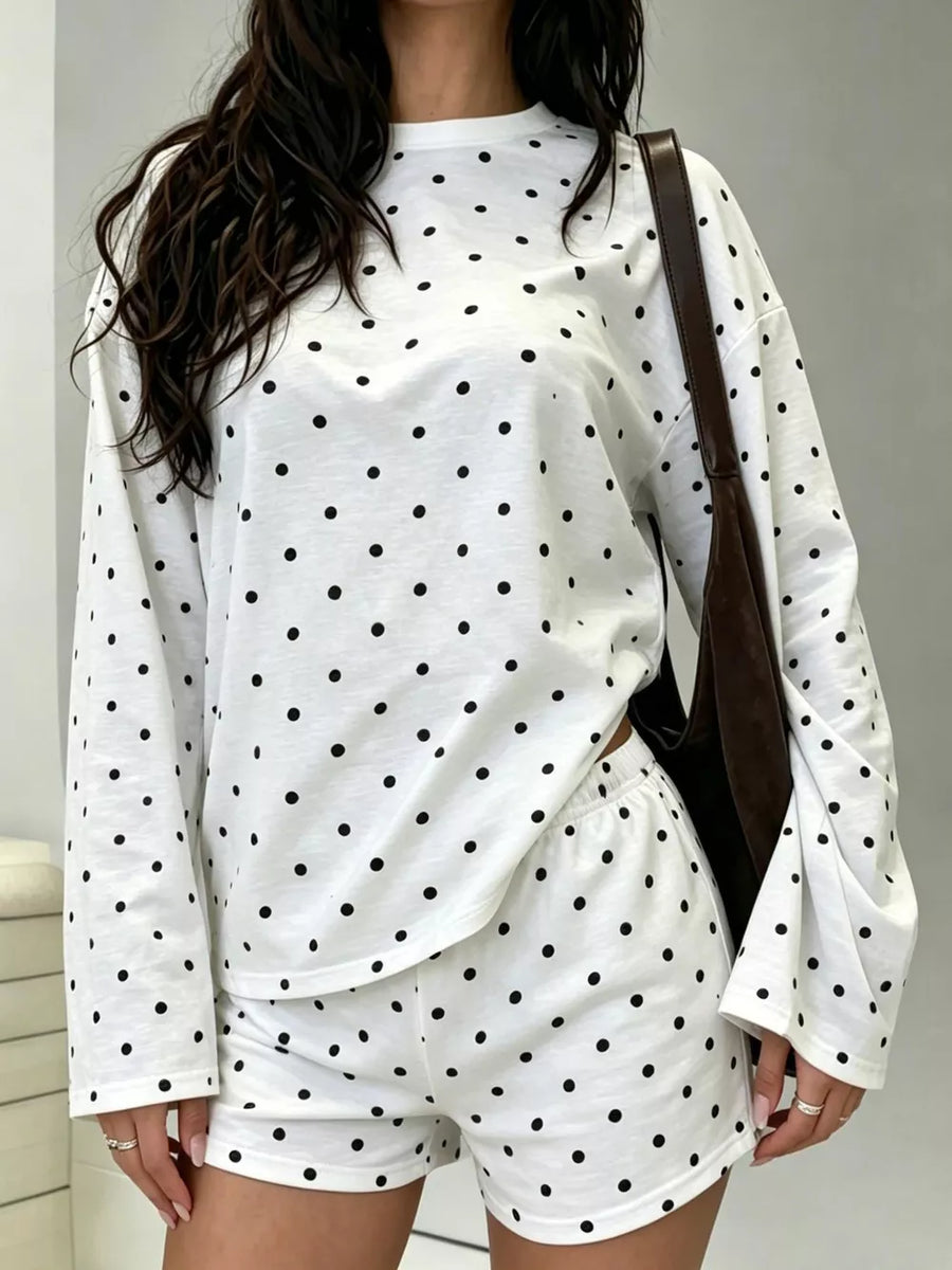 black pajama set featuring stretch and polka dot