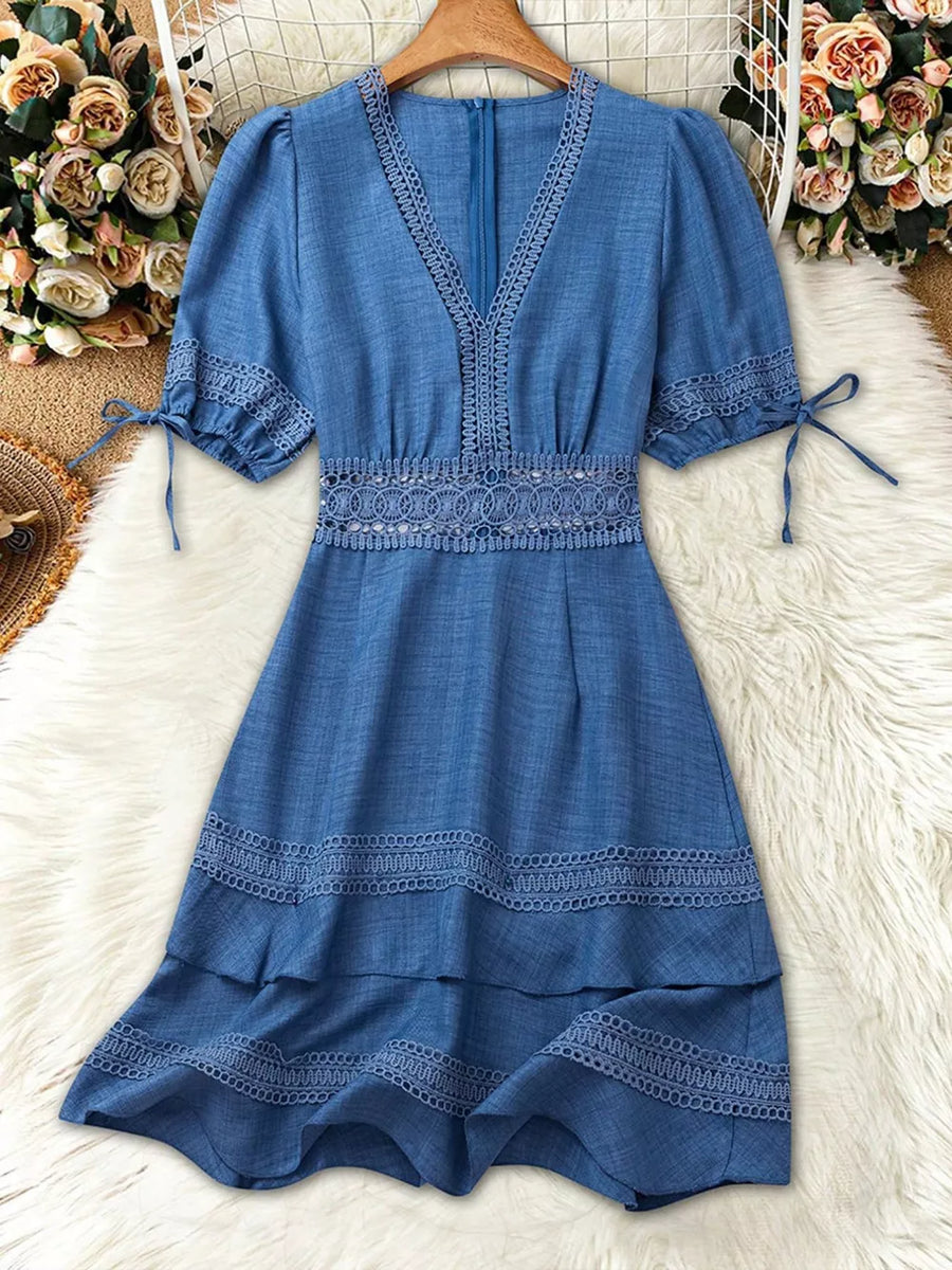 Blue lace-embellished V-neck mini dress with puff sleeves and tiered hem