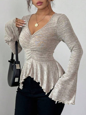modern peplum top in Pink with v-neck