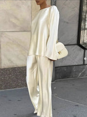 Cream satin loungewear set with boat neck top and wide leg pants