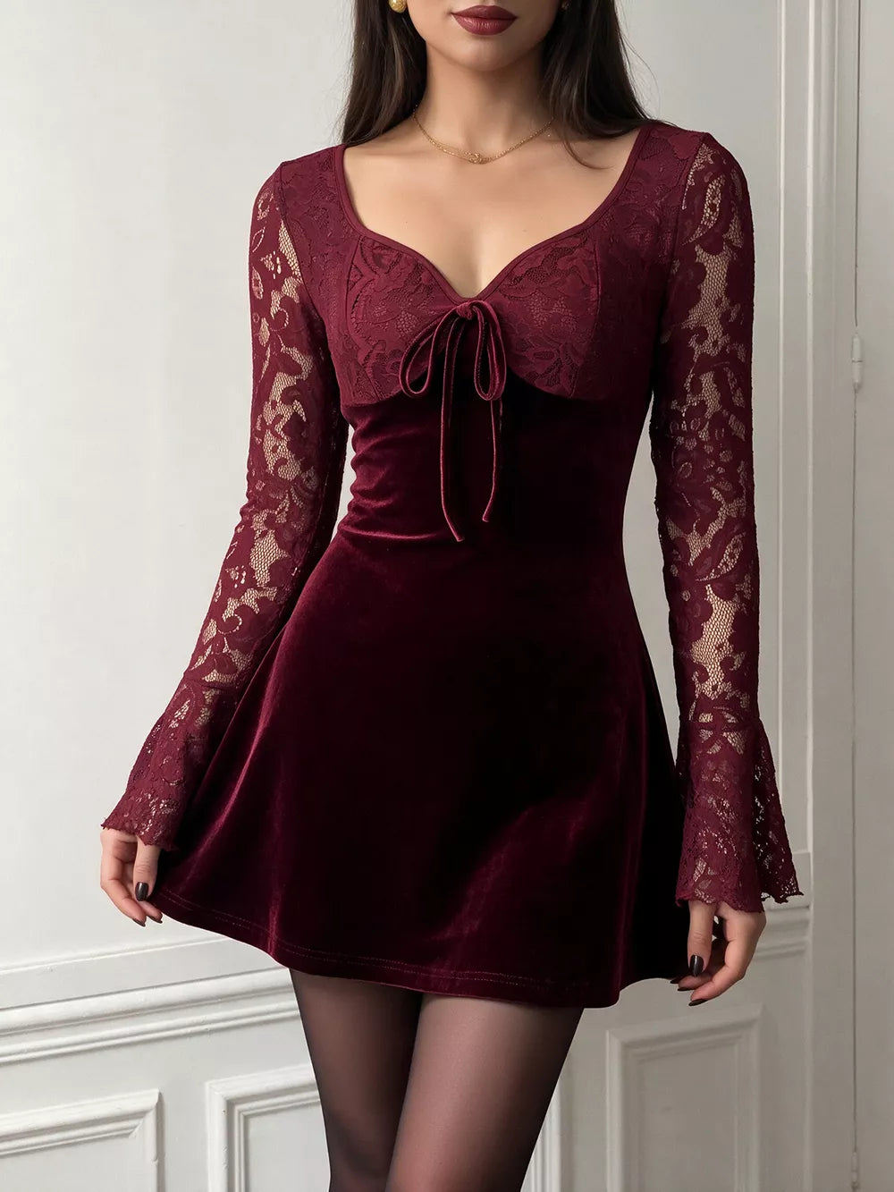 Burgundy mini dress featuring lace and lace