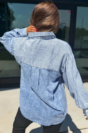 light blue button-down shirt with hip-length and button-front