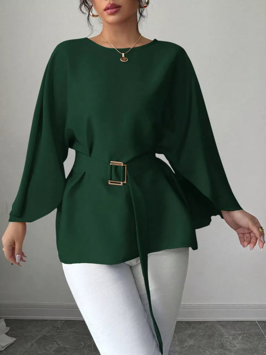 Elegant olive green belted blouse with batwing sleeves and gold buckle detail.