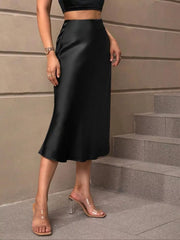 Black satin high-waisted midi skirt with a subtle sheen.