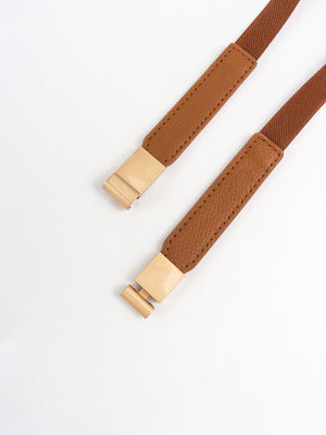 Caramel elasticated belt with leather detail and gold buckle closure.