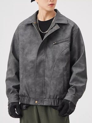 Men's dark gray faux leather zip-up jacket with a chest pocket detail.