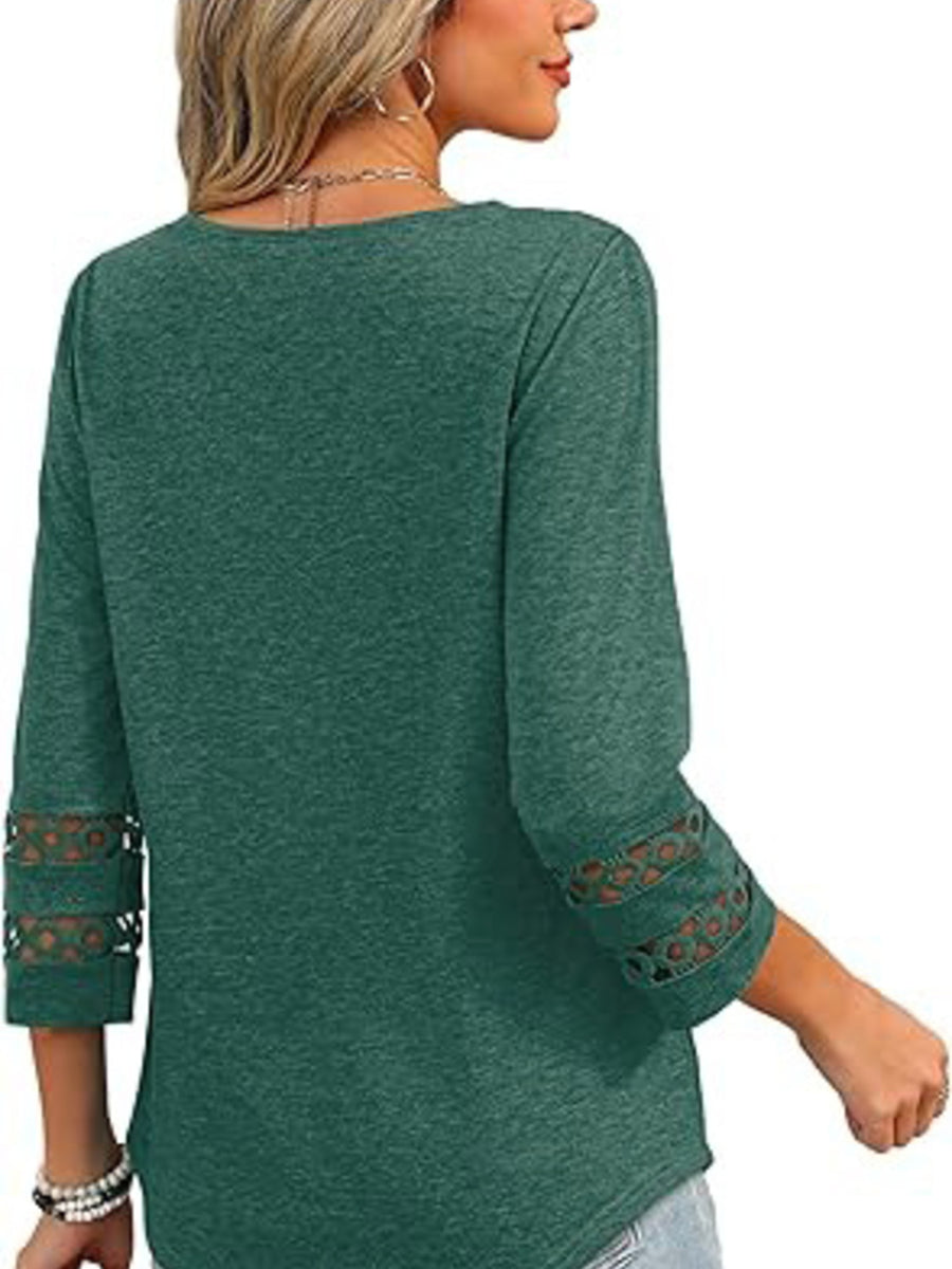 Dark green 3/4 sleeve t-shirt with cutout detail on sleeves.