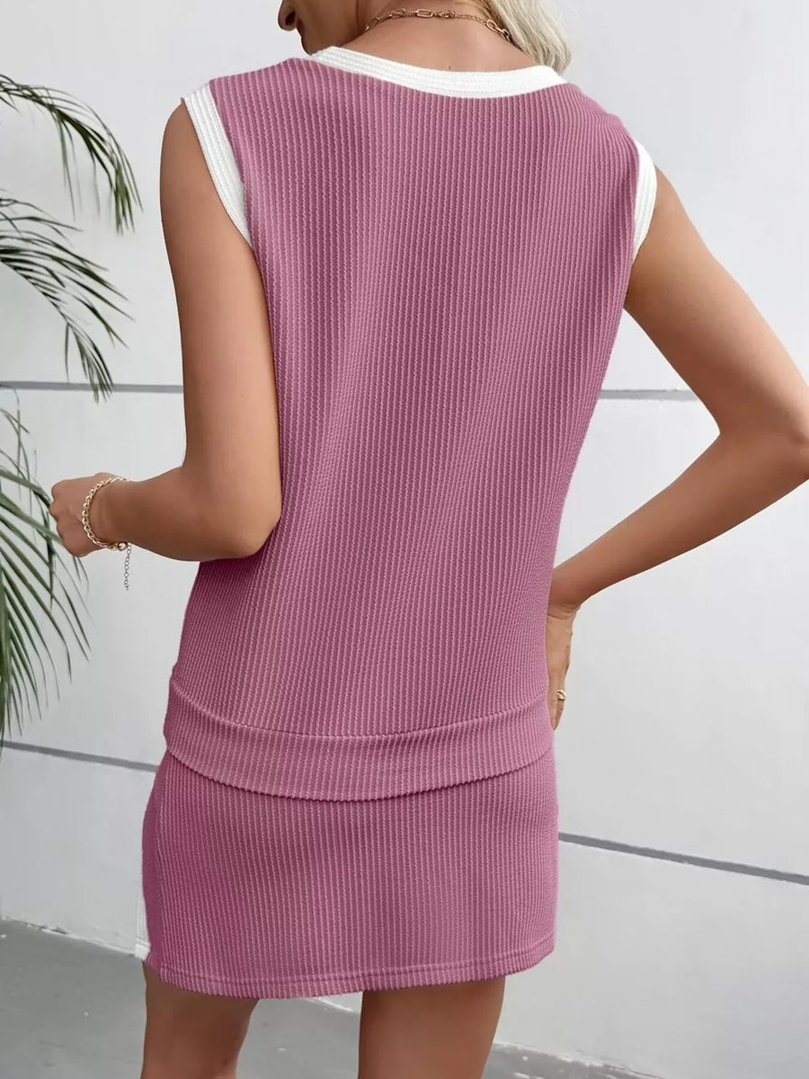 Pink ribbed knit sleeveless top and skort set with white trim