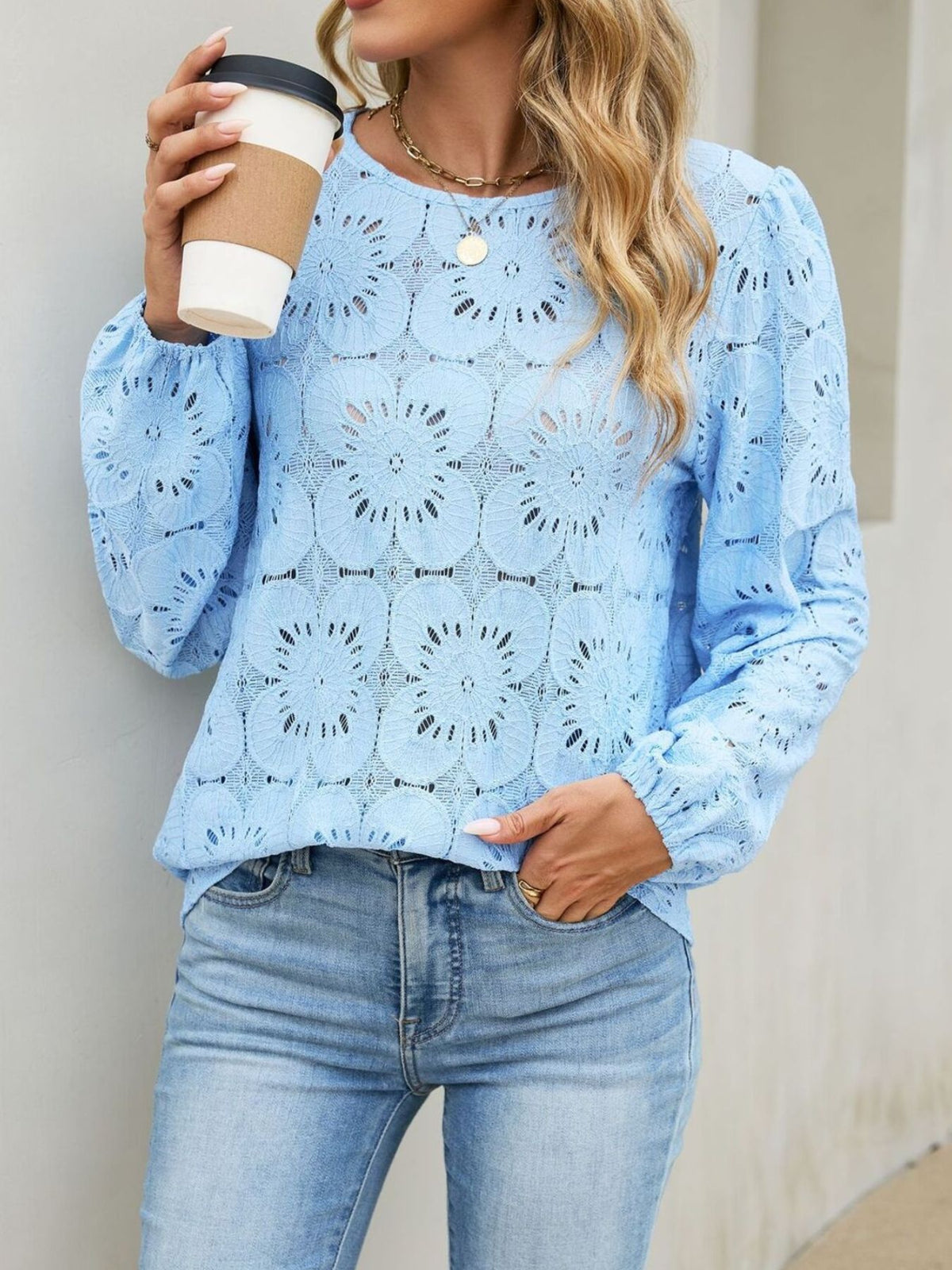 White blouse featuring lace and floral
