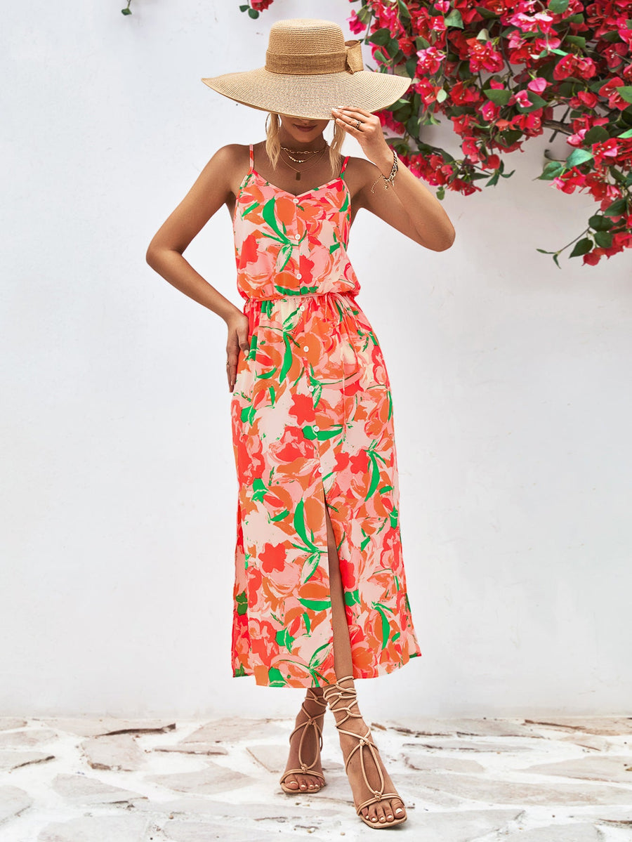Floral print midi dress with button-down front, spaghetti straps, elastic waist, and thigh-high slit.