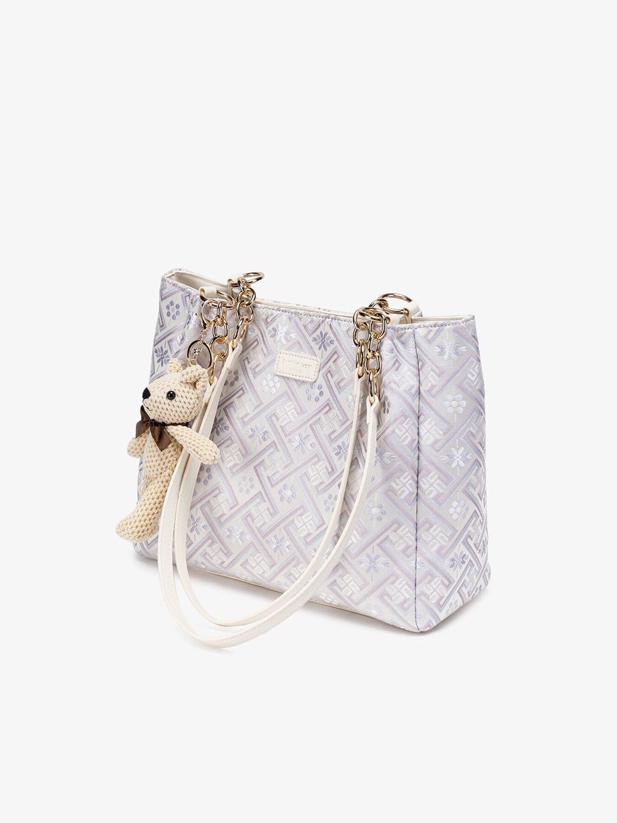 handbag featuring geometric in light blue with Polyester Imported Size &amp texture