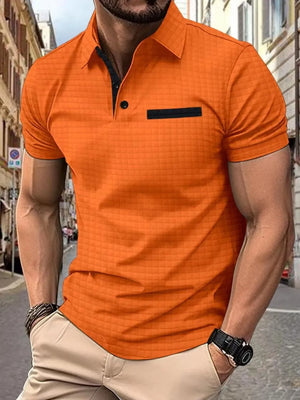 Orange textured polo shirt with black contrast pocket and collar detail.
