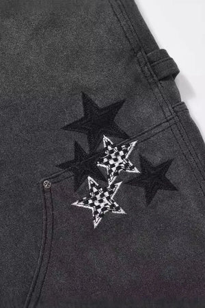 Dark carpenter jeans with embroidered stars, some with checkered pattern detail.