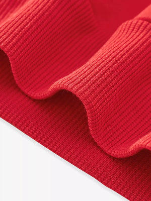 Red crew neck baby sweatshirt with ribbed cuffs and hem detail.