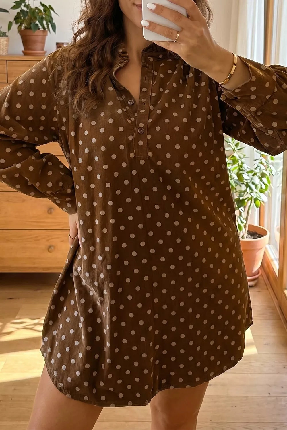 cream shift dress featuring buttoned and polka dot
