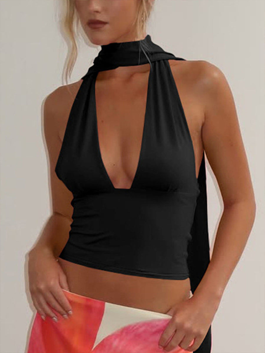 Black halter neck cami top with deep v-neck and adjustable ties.