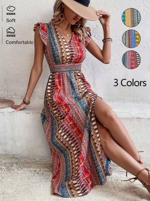 Bohemian maxi dress with ruffle sleeves, V-neck, smocked waist, and high slit in a colorful geometric print.