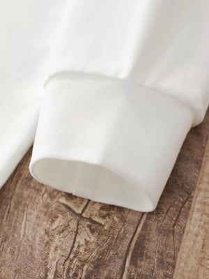 Children's white long-sleeve pajama cuff detail