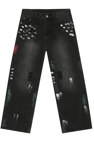 Dark wide-leg jeans with painterly distressed details and brushstroke accents.