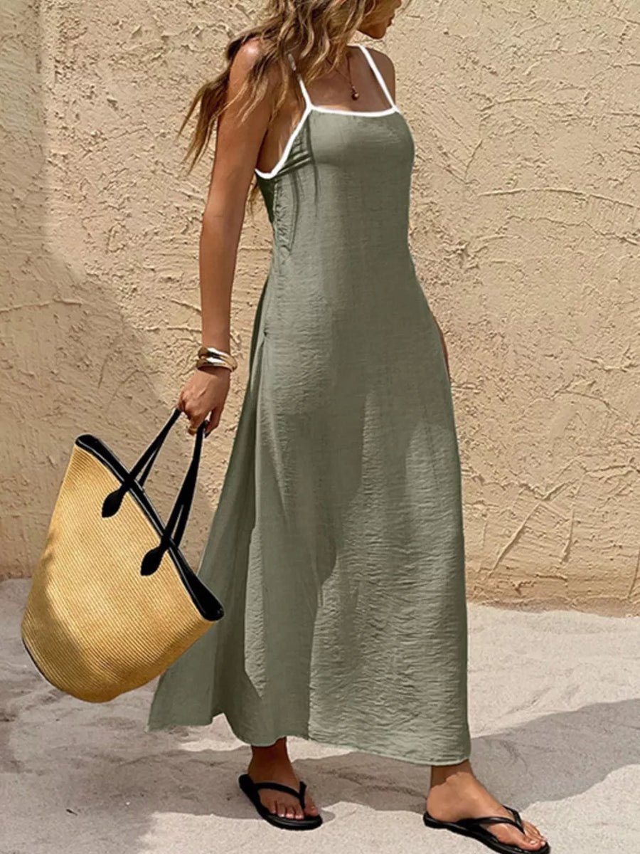 Olive spaghetti strap maxi dress with white contrasting trim and a-line cut.